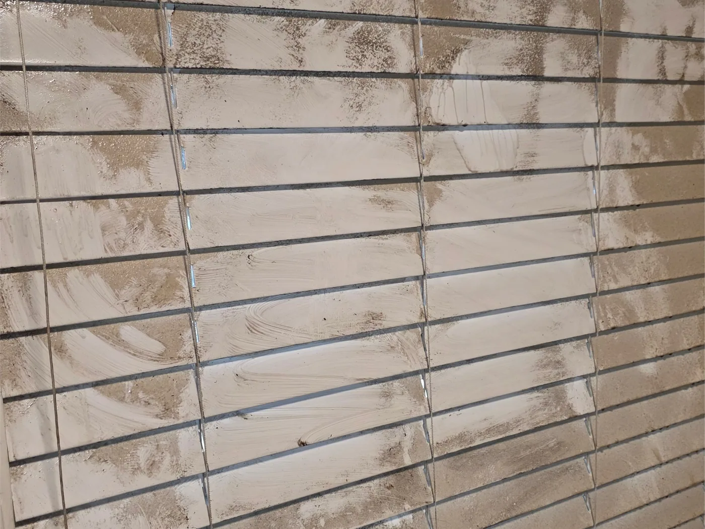 Window blinds before cleaning